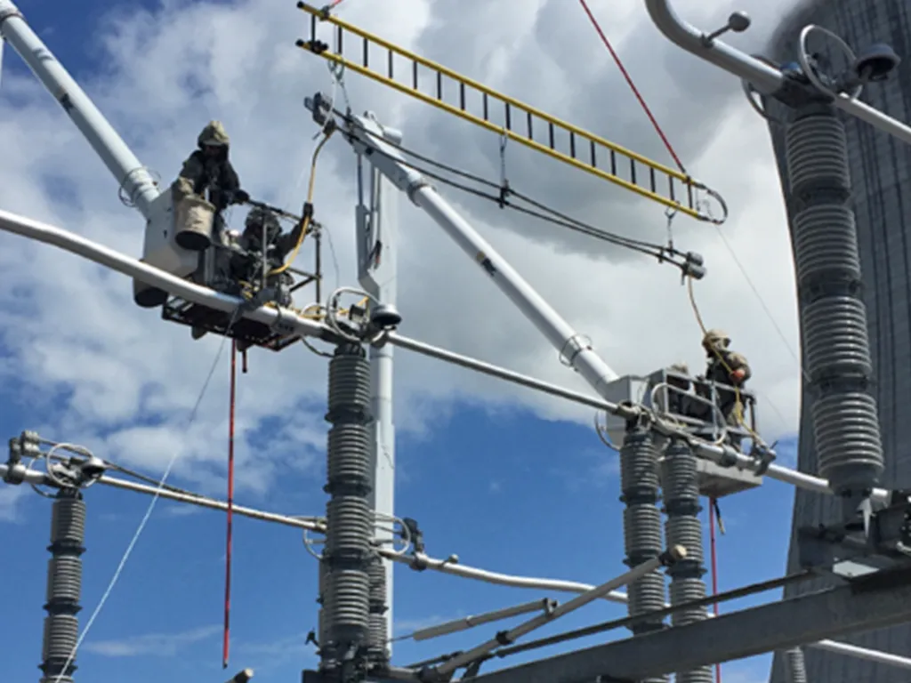 National Powerline worker working on a substation.